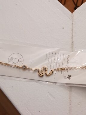 Gold Snake Link Bracelet with Crystal Accent